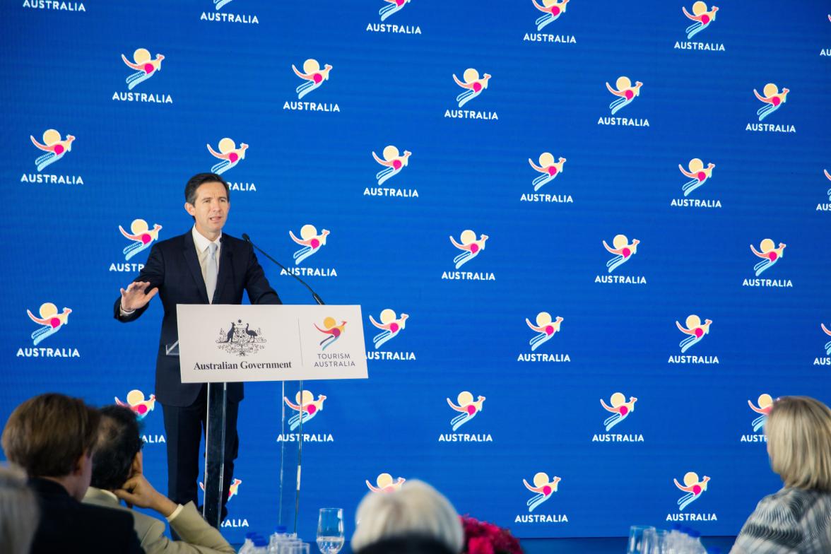 Photo of Minister Simon Birmingham speaking on stage at the Australian Tourism and the T20 World Cup.