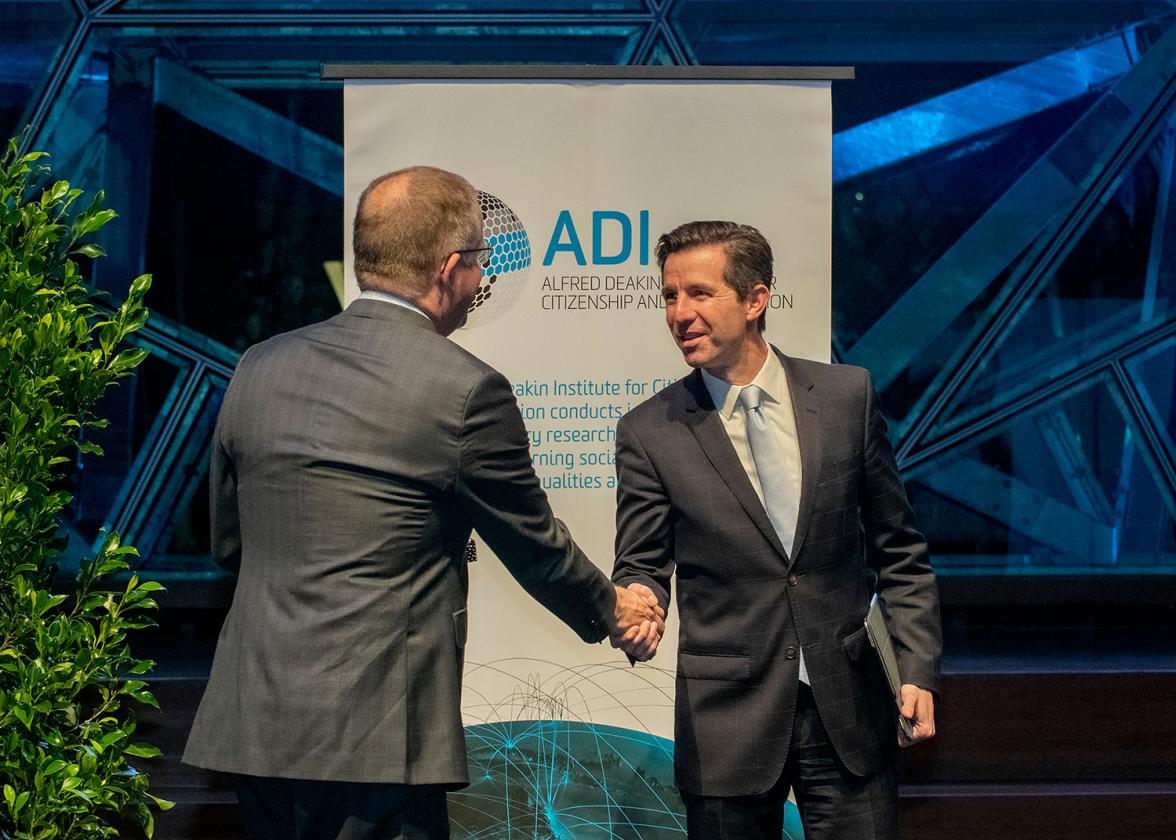 Photo of Minister Birmingham shaking hands with Deakin University Vice-Chancellor Professor Iain Martin