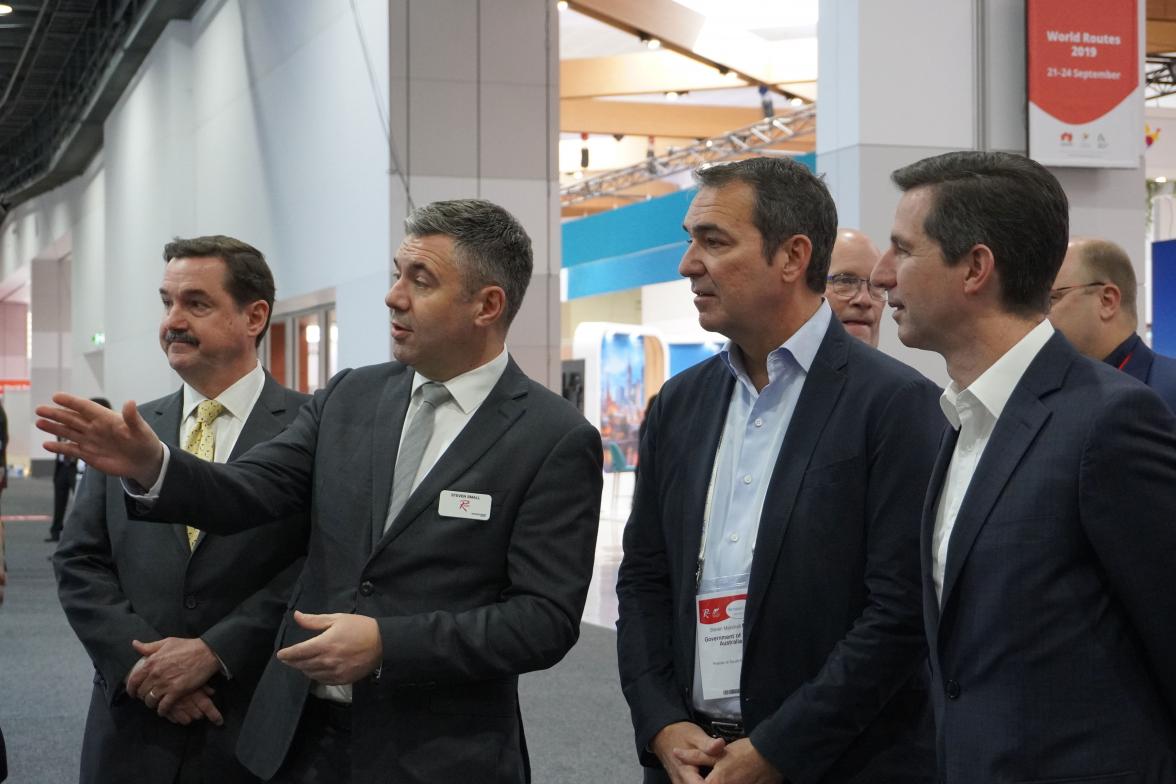 Photo of Minister Birmingham with South Australian Premier Steven Marshall and World Routes Director of Events Steven Small.