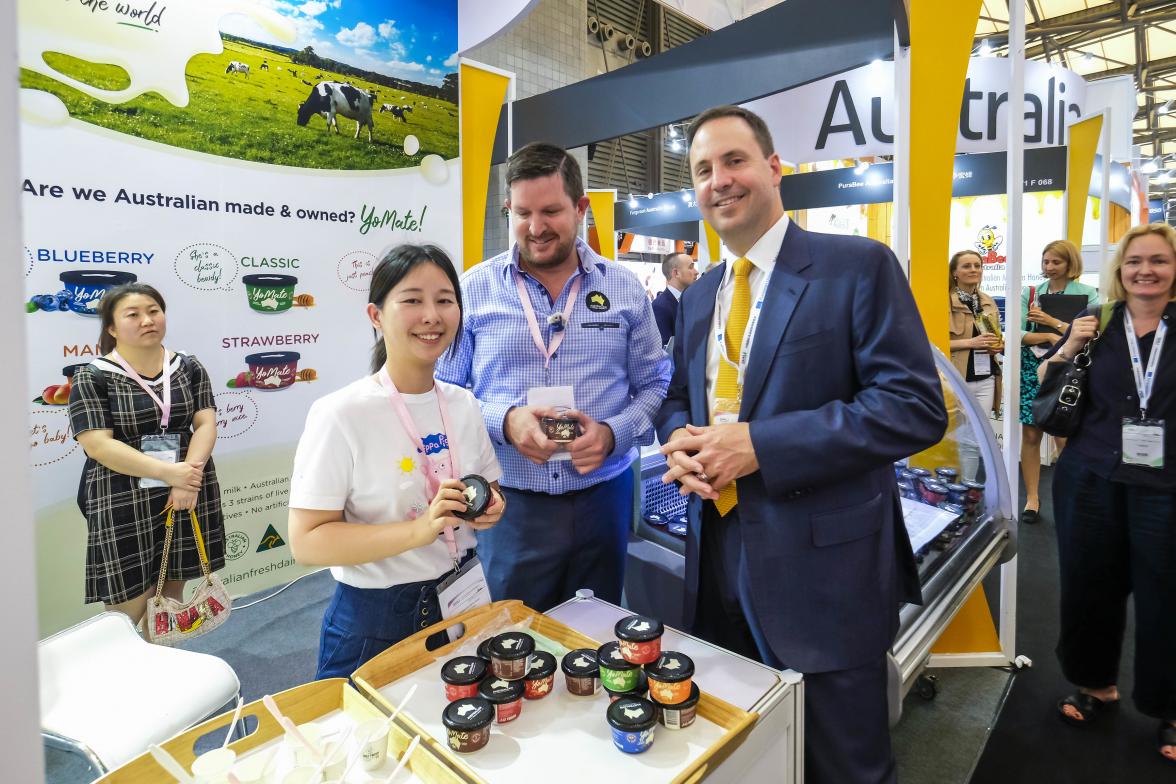 Federal Minister for Trade, Tourism & Investment Steven Ciobo at the Shanghai SIAL Food Industry Expo with the Director of Australian Fresh Dairy Paul Hayes and Cherry Yang at the Australian Pavillion.                                         Photo credit