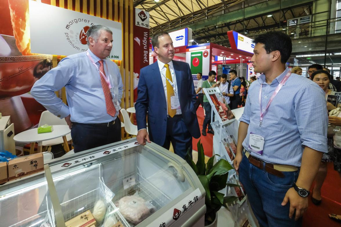 Federal Minister for Trade, Tourism & Investment Steven Ciobo at the Shanghai SIAL Food Industry Expo talking with the Chinese Director of Margaret River Permium Meat Exports William Li (R) and MD John McLeod (L).                                         