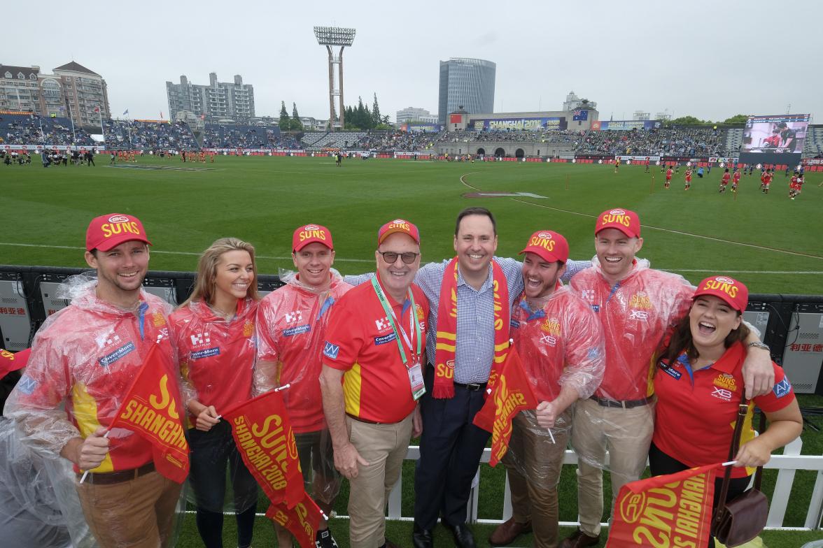 Federal Minister for Trade, Tourism & Investment Steven Ciobo at the AFL match in Shanghai with (left of minister) Gold Coast Suns Chairman Tony Cochrane and Suns fans from left: Kiel Sinclair, Giulia Badalotti, Darryl Dyson, Todd Matheson, Flynn McFarlan