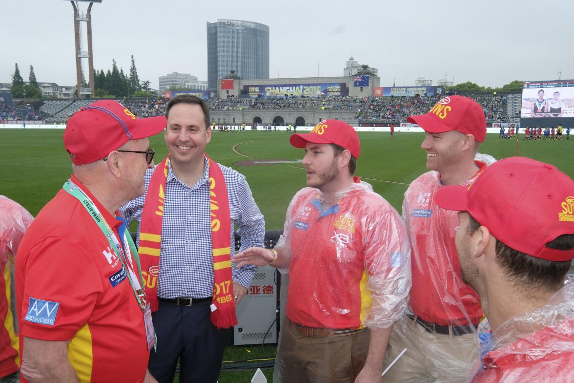 Federal Minister for Trade, Tourism & Investment Steven Ciobo at the AFL match in Shanghai with (L) Gold Coast Suns Chairman Tony Cochrane and Suns fans Todd Matheson, Flynn McFarlane                  Photo credit: DFAT/Chris Crerar(c)DFAT Australia / Hi