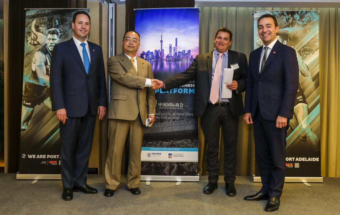 Federal Minister for Trade, Tourism & Investment Steven Ciobo after the signing of a letter of intent at the Port Adelaide Football Club Business to Business Platform event with (L to R) President of KaiLai Capital Mr Zack Wang, representative of Micromet