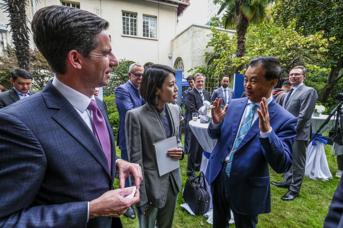 Federal Minister for Trade, Tourism & Investment Simon Birmingham greets Shanghai Cred's Chairman Gui Guojie at the Australian Consulate during an AFL China press call . Photo credit: DFaT/Chris CrerarHigh res filename reference: 5094