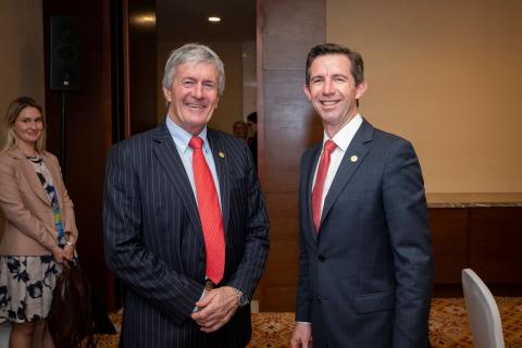 Simon Birmingham with David Parker posing together for a photo. 