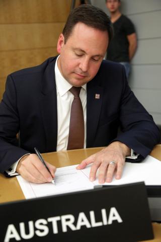 Trade, Tourism and Investment Minister, Steven Ciobo during the Signing Ceremony for Multilateral Convention to Implement Tax Treaty Related Measures to Prevent BEPS at the OECD, 7 June 2017.