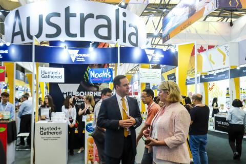 Federal Minister for Trade, Tourism & Investment Steven Ciobo at the Shanghai SIAL Food Industry Expo talking CEO of Food SA Catherine Sayer at the Australian Pavillion.                                         Photo credit: DFaT/Chris Crerar(c)DFaT Aust