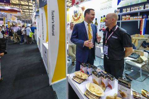 Federal Minister for Trade, Tourism & Investment Steven Ciobo at the Shanghai SIAL Food Industry Expo with MD of Tucker's Natural, Sam Tucker,  at the Australian Pavillion.                                         Photo credit: DFaT/Chris Crerar(c)DFaT A