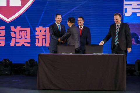 Federal Minister for Trade, Tourism & Investment Steven Ciobo and the Premier of South Australia the Hon Steven Marshall congratulating the General Manager of Shanghai CRED Real Estate Mr Gui Guojie after witnessing the signing of an MOU with  the CEO of 