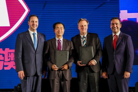 Federal Minister for Trade, Tourism & Investment Steven Ciobo after the signing of the MOU at the 2018 Shanghai AFL Gala Dinner with (L to R) General Manager of Shanghai CRED Real Estate Mr Gui Guojie, the CEO of Port Adelaide Football Club Mr Keith Thoma