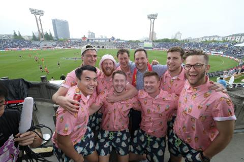 Federal Minister for Trade, Tourism & Investment Steven Ciobo at the AFL match in Shanghai with Port Adelaide fans Watsy's Warriors