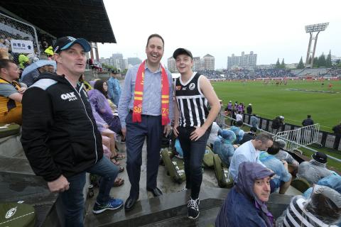 Federal Minister for Trade, Tourism & Investment Steven Ciobo at the AFL match in Shanghai with Port Adelaide fans (L) Robert Blackborough and Senna Blackborough      Photo credit: DFAT/Chris Crerar(c)DFAT Australia / High res filename reference: 7122