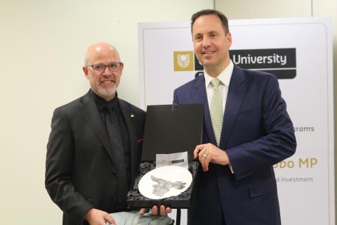 Trade, Tourism and Investment Minister Steven Ciobo receives a gift from Deputy Vice-Chancellor International Professor Seth Kunin whilst attending Curtin University to welcome the first students.